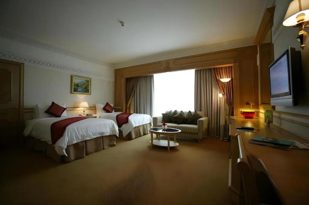 Bed in The Rizqun International Hotel