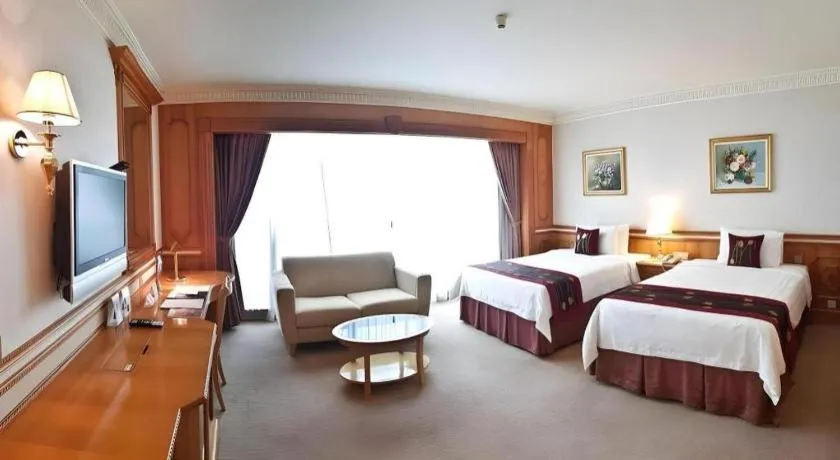 Bed in The Rizqun International Hotel