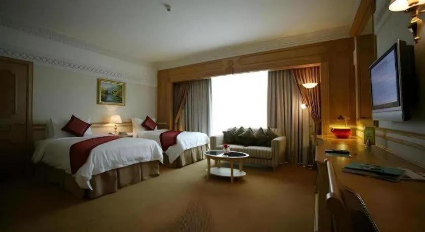 Bed in The Rizqun International Hotel