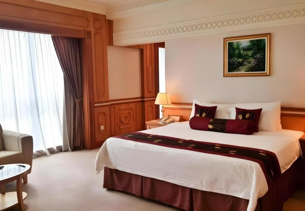 Bed in The Rizqun International Hotel