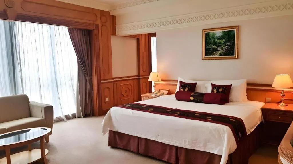 Bed in The Rizqun International Hotel