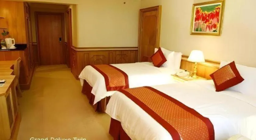 Bed in The Rizqun International Hotel
