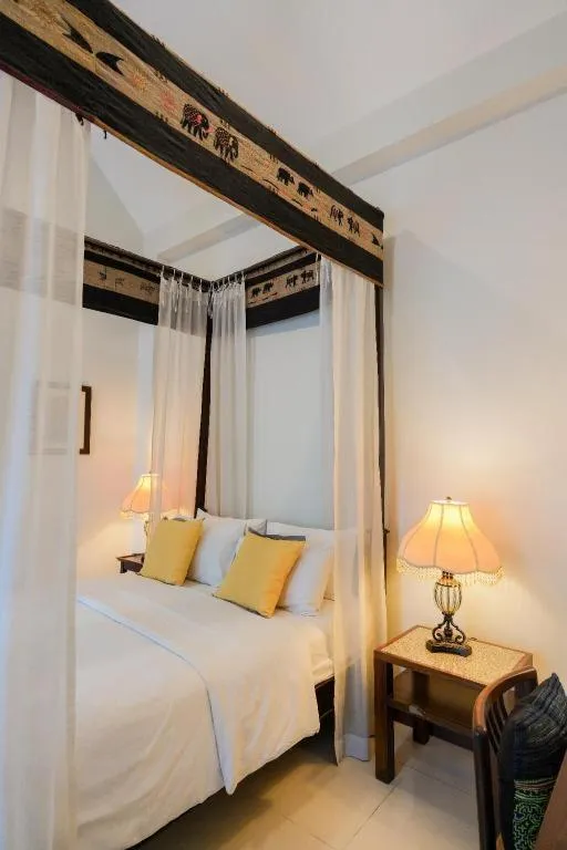 Bed in Baan Klang Wiang Hotel