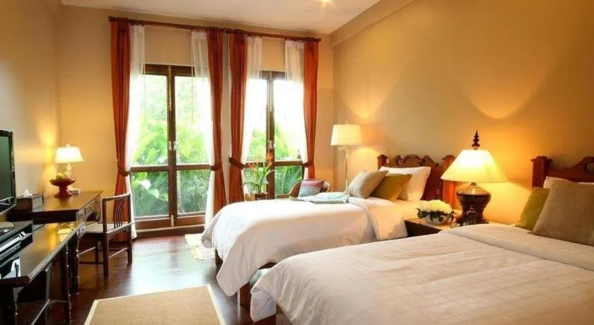 Bed in Baan Klang Wiang Hotel