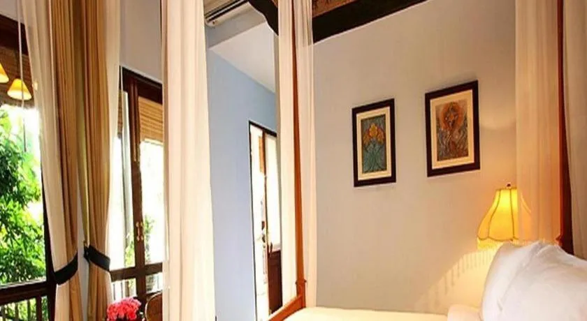 Bed in Baan Klang Wiang Hotel