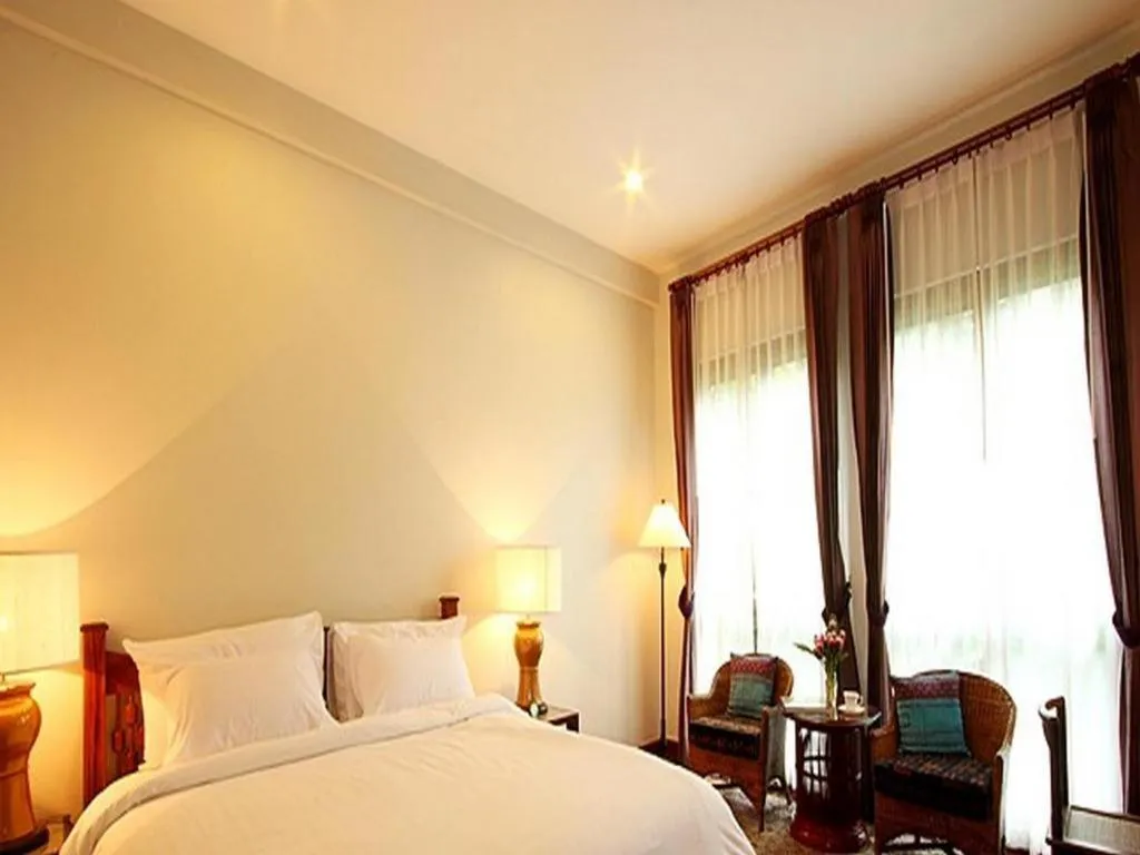 Bed in Baan Klang Wiang Hotel