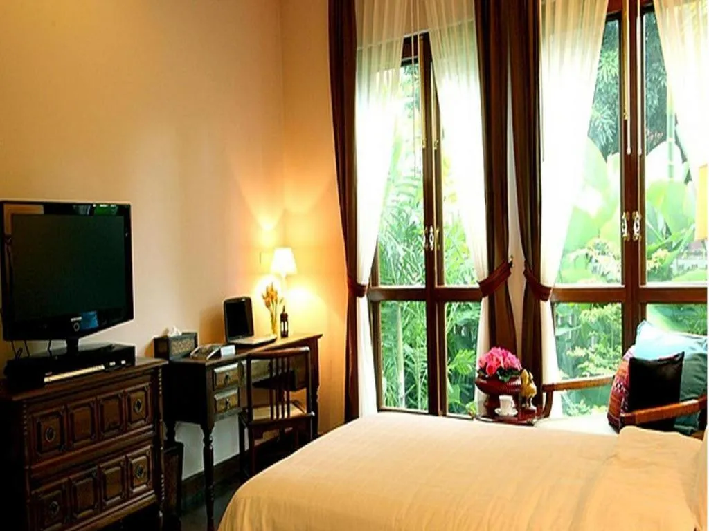 Bed in Baan Klang Wiang Hotel