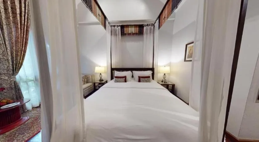 Bed in Baan Klang Wiang Hotel