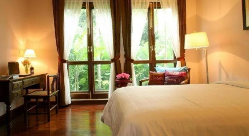 Bed in Baan Klang Wiang Hotel