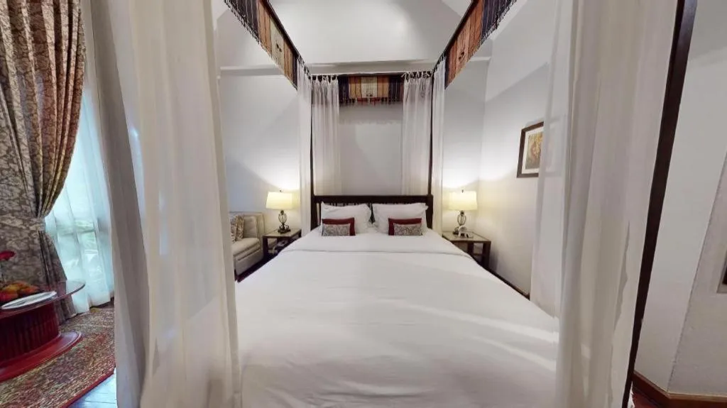 Bed in Baan Klang Wiang Hotel