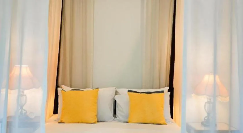 Bed in Baan Klang Wiang Hotel