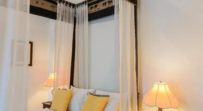 Bed in Baan Klang Wiang Hotel