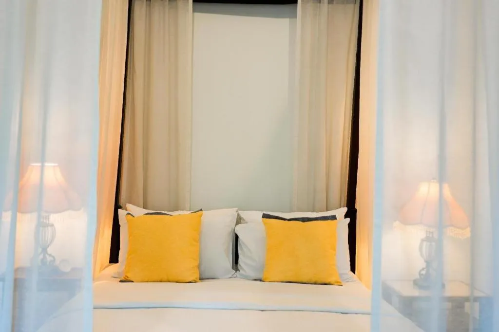 Bed in Baan Klang Wiang Hotel