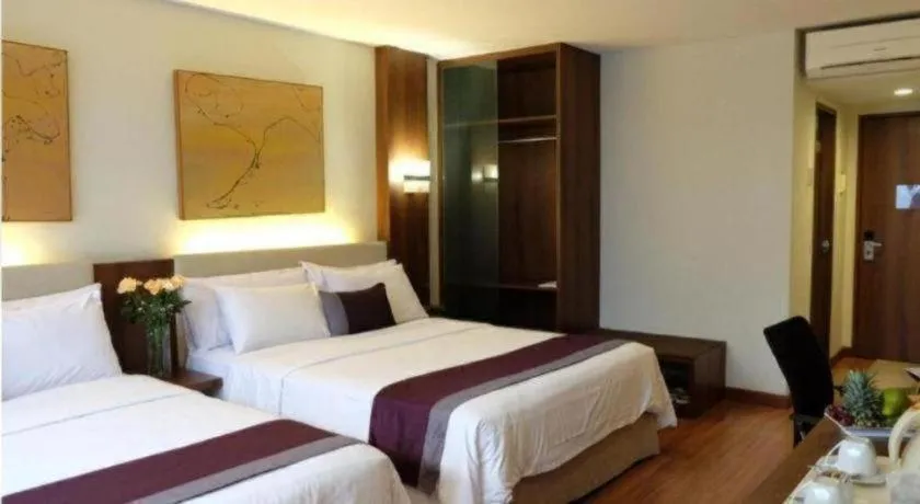 Bed in Grand Cemara Hotel