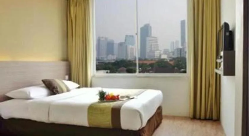 Bed in Grand Cemara Hotel