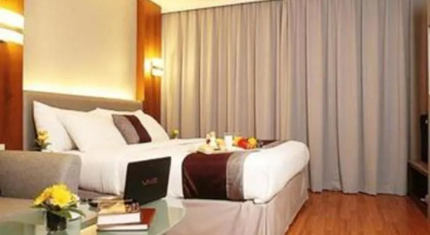 Bed in Grand Cemara Hotel