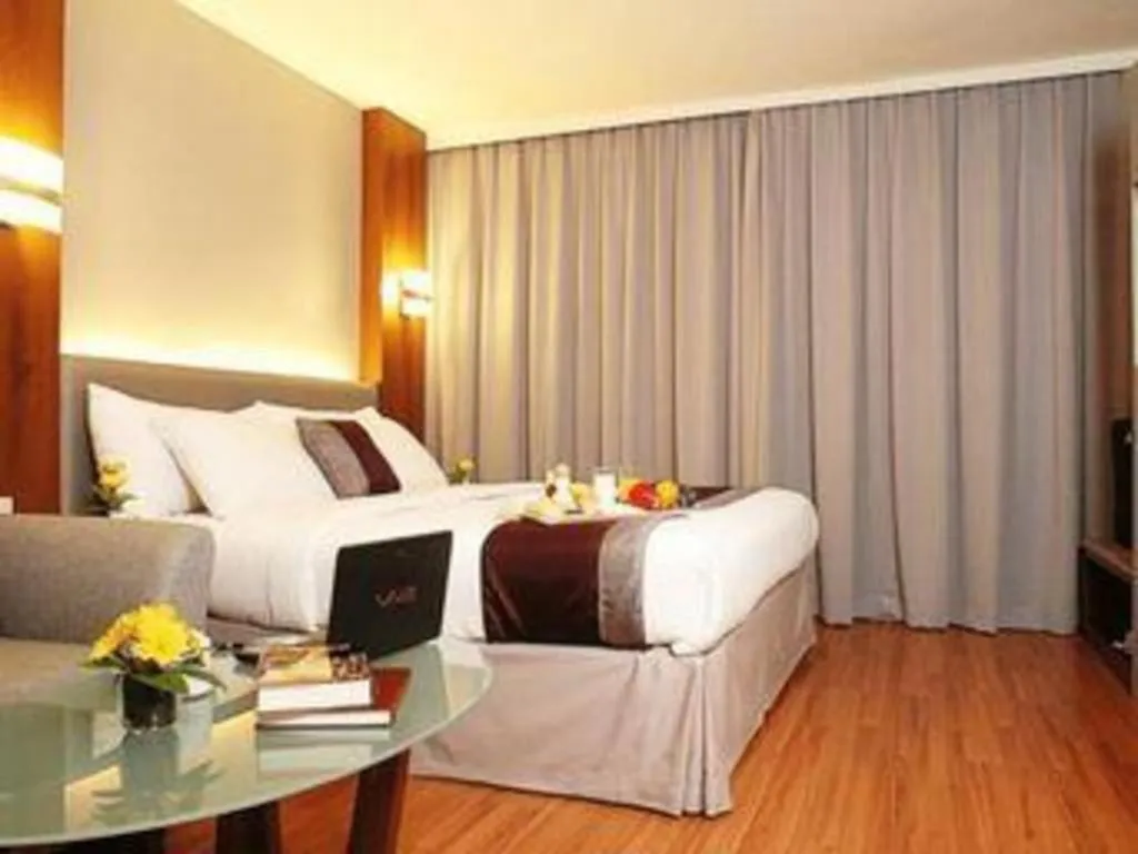 Bed in Grand Cemara Hotel
