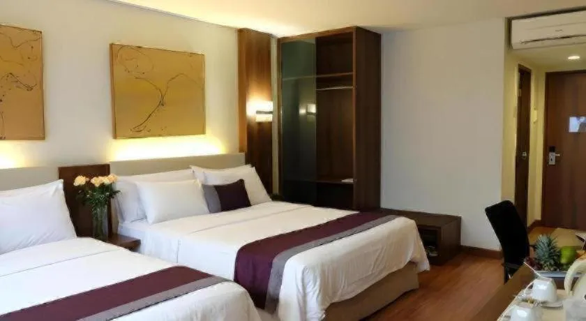 Bed in Grand Cemara Hotel