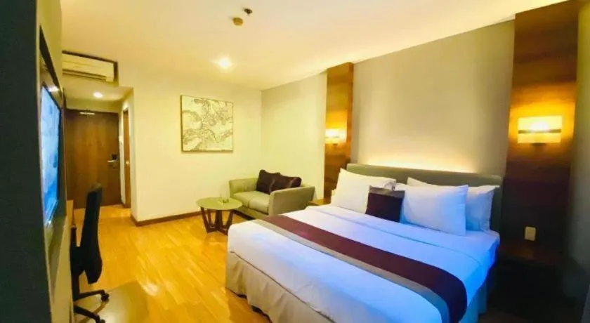 Bed in Grand Cemara Hotel