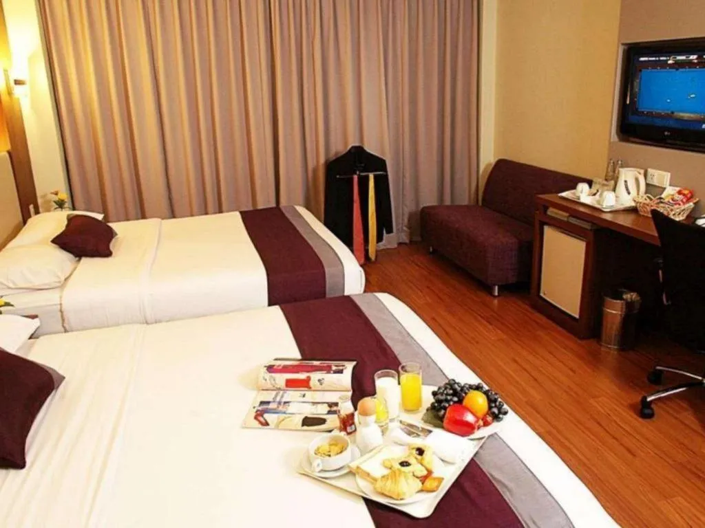 Bed in Grand Cemara Hotel