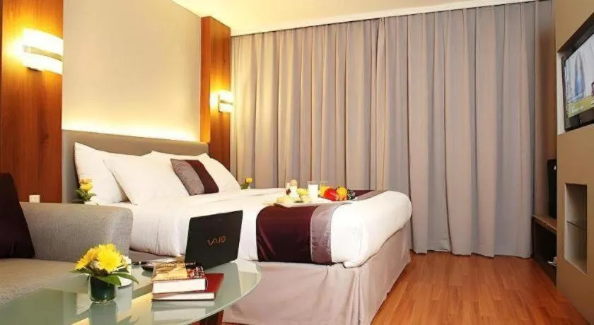 Bed in Grand Cemara Hotel