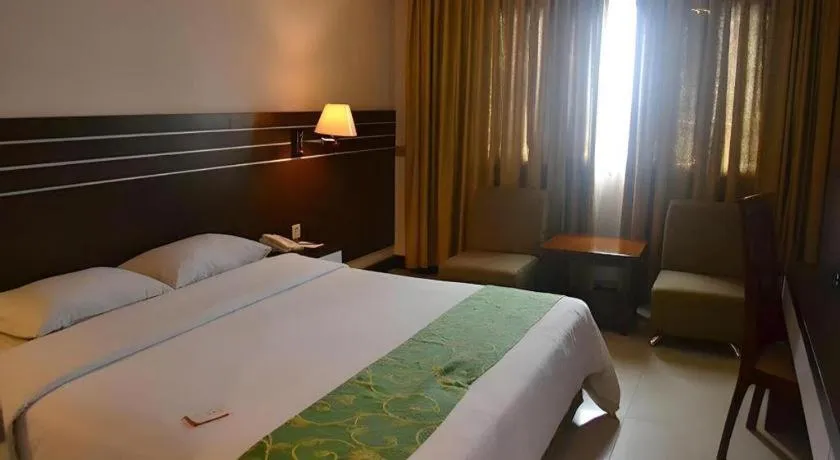 Bed in Grand Antares Hotel