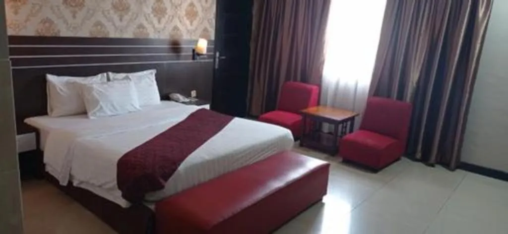 Bed in Grand Antares Hotel