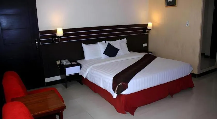 Bed in Grand Antares Hotel