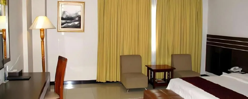 Bed in Grand Antares Hotel