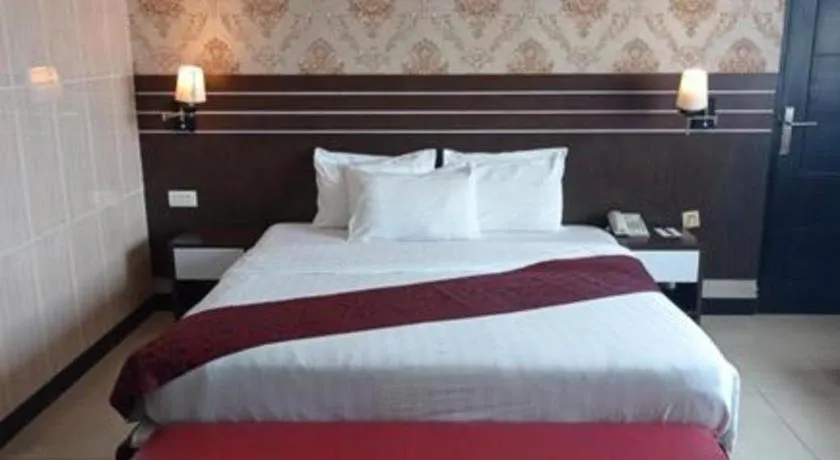 Bed in Grand Antares Hotel