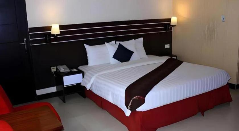 Bed in Grand Antares Hotel