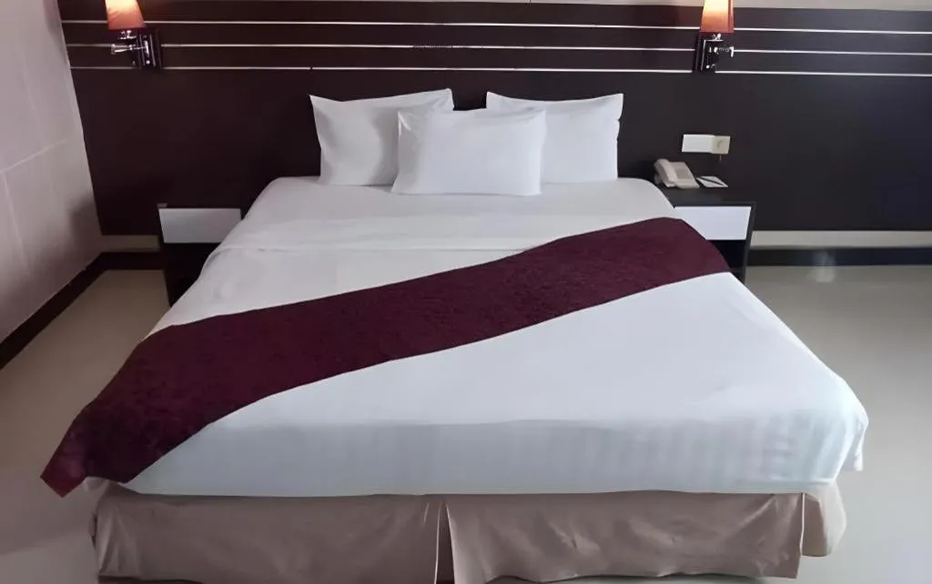 Bed in Grand Antares Hotel