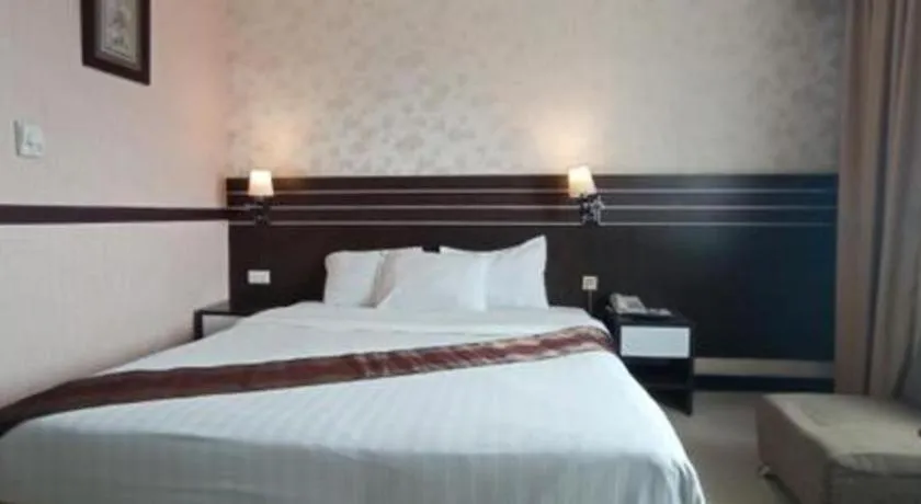 Bed in Grand Antares Hotel