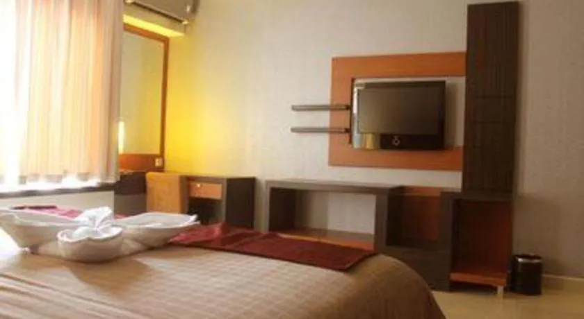 Bed in Travello Hotel Manado