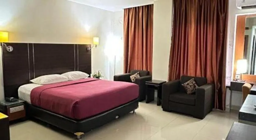 Bed in Travello Hotel Manado