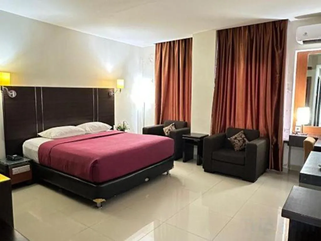 Bed in Travello Hotel Manado