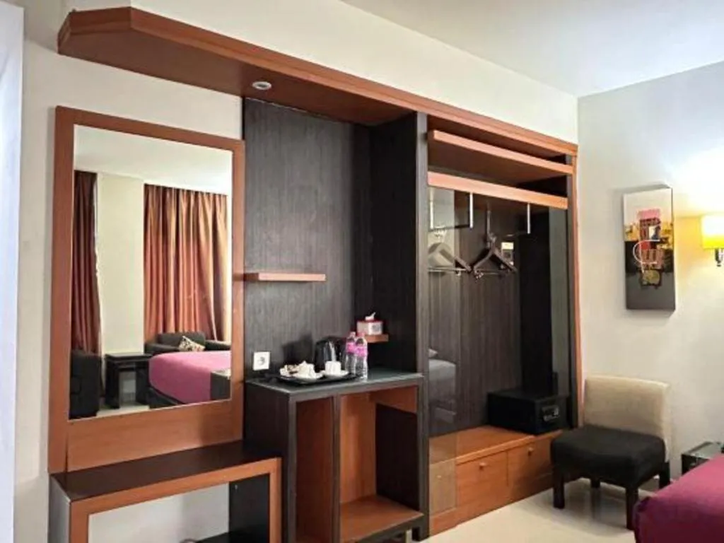 Bed in Travello Hotel Manado