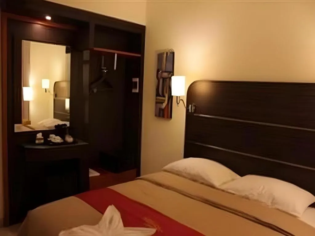 Bed in Travello Hotel Manado