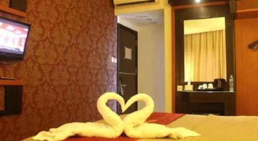 Bed in Travello Hotel Manado