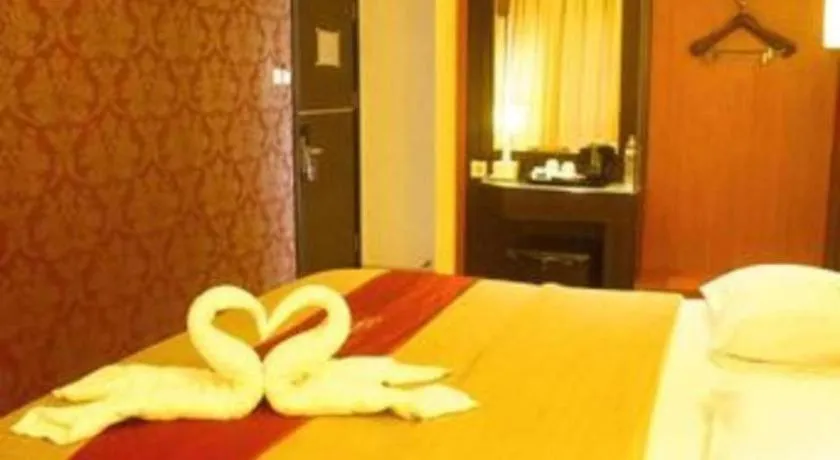 Bed in Travello Hotel Manado