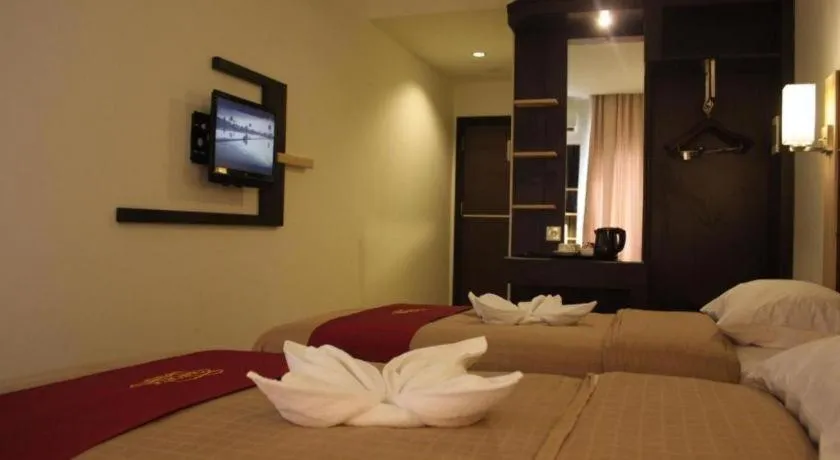 Bed in Travello Hotel Manado