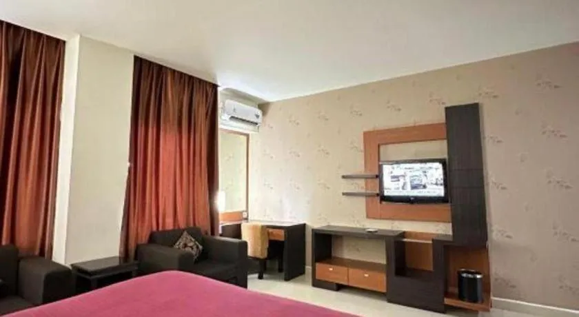 Bed in Travello Hotel Manado