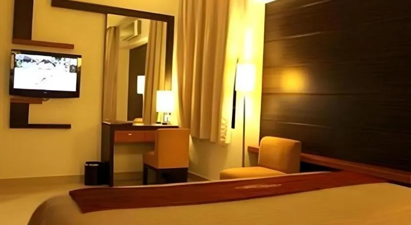 Bed in Travello Hotel Manado