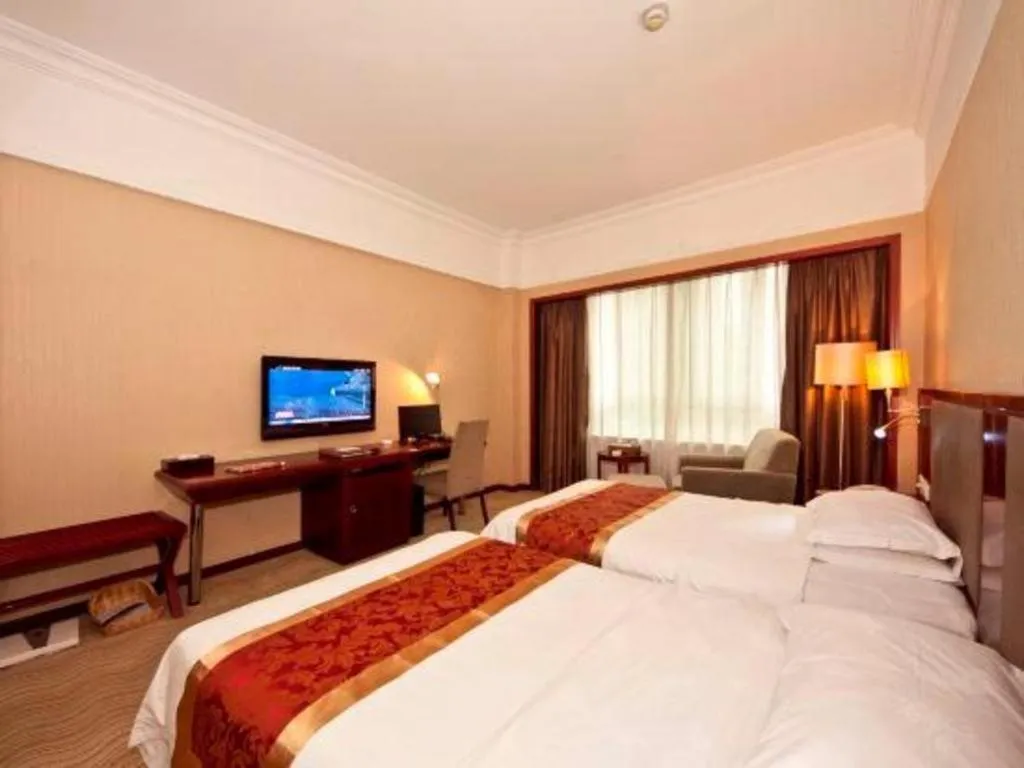 Bed in Fujian Galaxy Garden Hotel