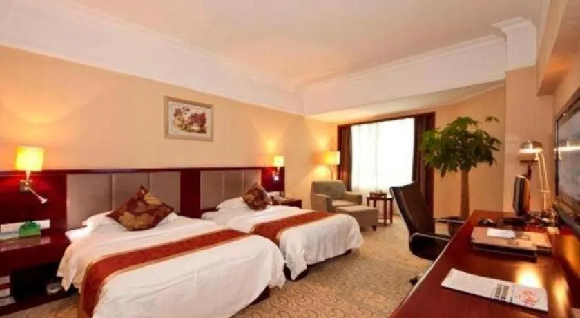 Bed in Fujian Galaxy Garden Hotel