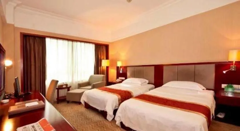 Bed in Fujian Galaxy Garden Hotel