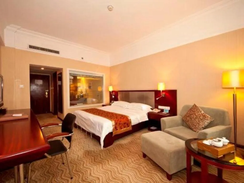 Bed in Fujian Galaxy Garden Hotel