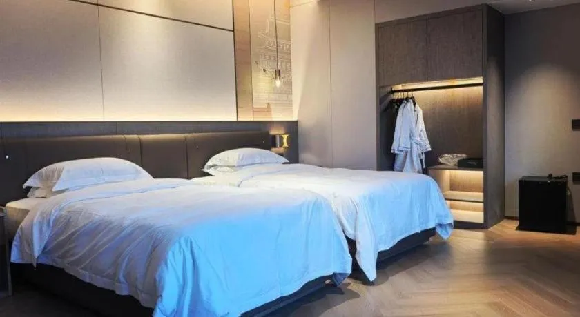 Bed in Fujian Galaxy Garden Hotel