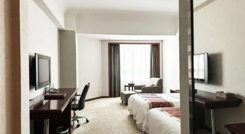 Bed in Fujian Galaxy Garden Hotel