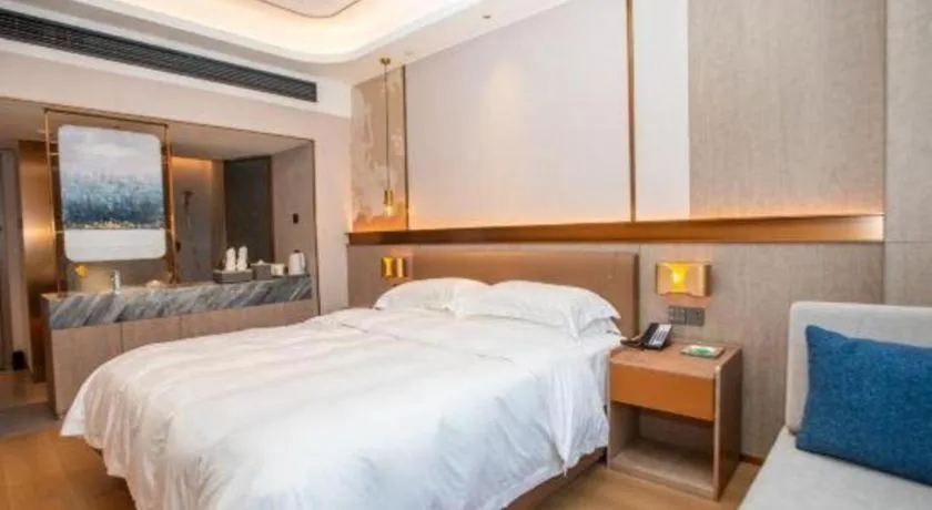 Bed in Fujian Galaxy Garden Hotel